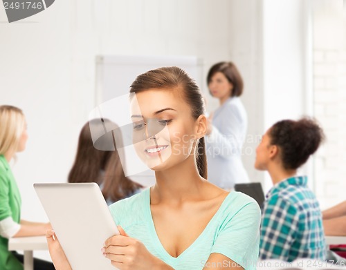 Image of student with tablet pc in college