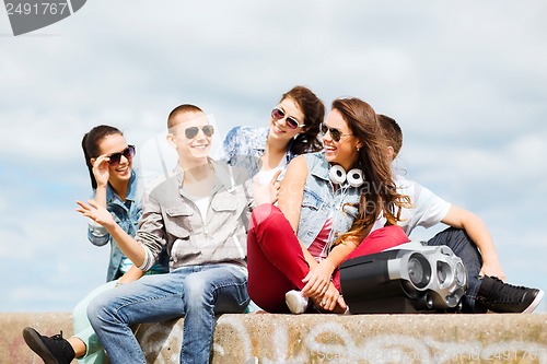 Image of group of teenagers hanging out