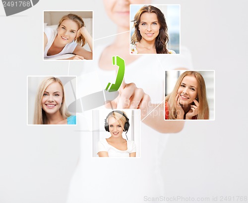 Image of woman with virtual screen and contact icons