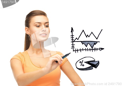 Image of businesswoman drawing graphs in the air