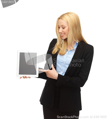 Image of smiling woman pointing at tablet pc