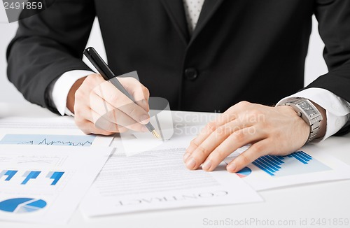 Image of man with contract
