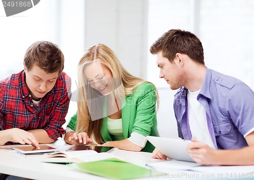 Image of students browsing in tablet pc at school