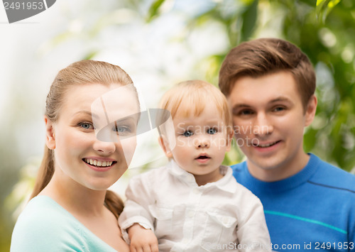 Image of happy family with adorable child