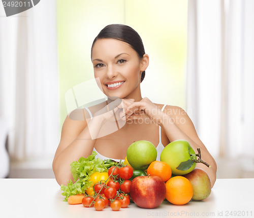 Image of woman with fresh fruits and vegetables