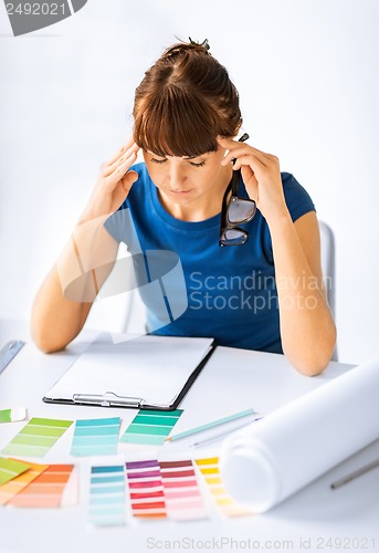 Image of stressed interior designer