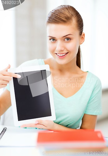 Image of smiling student girl with tablet pc