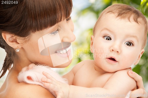 Image of happy mother with adorable baby