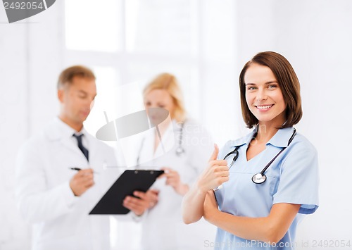 Image of young female doctor with stethoscope