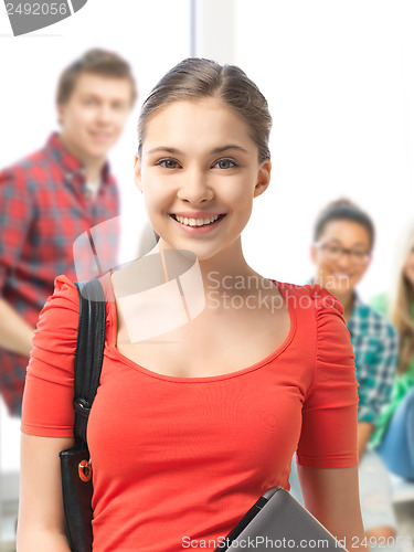 Image of student girl with laptop and school bag