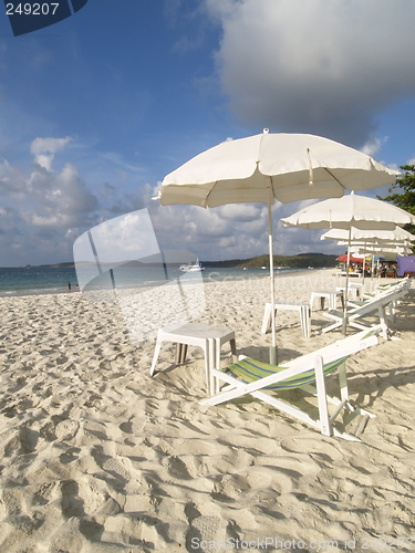 Image of Chairs and parasols on the beach