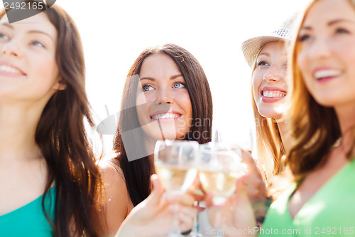 Image of girls with champagne glasses