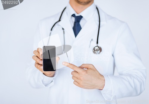 Image of doctor pointing at smartphone