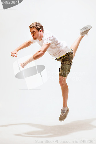 Image of male dancer jumping in the air