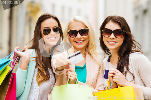 Image of girls with shopping bags in ctiy