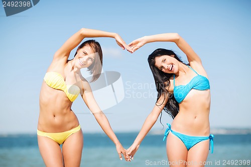Image of girls having fun on the beach