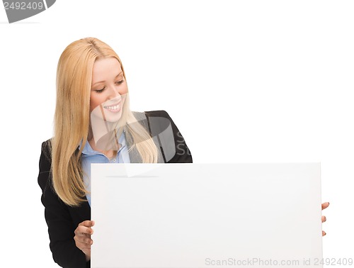 Image of businesswoman with white blank board