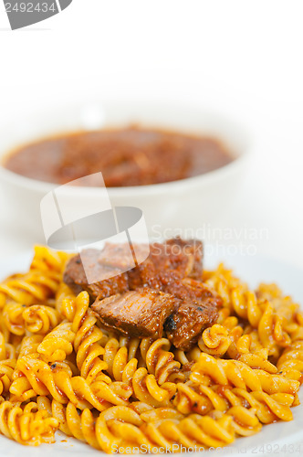 Image of fusilli pasta with neapolitan style ragu meat sauce