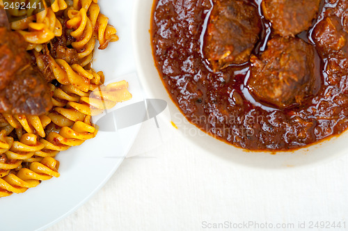 Image of fusilli pasta with neapolitan style ragu meat sauce