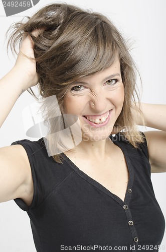 Image of real nice young woman in funny expression