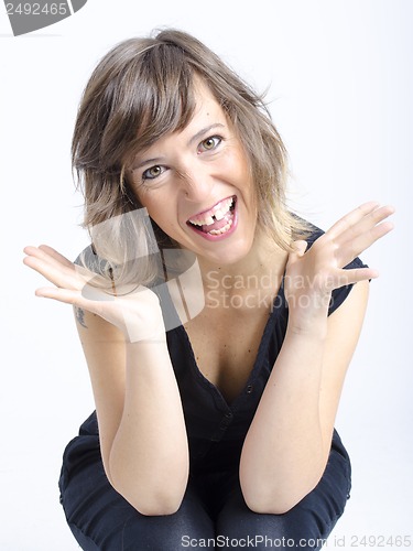 Image of real nice young woman in funny expression