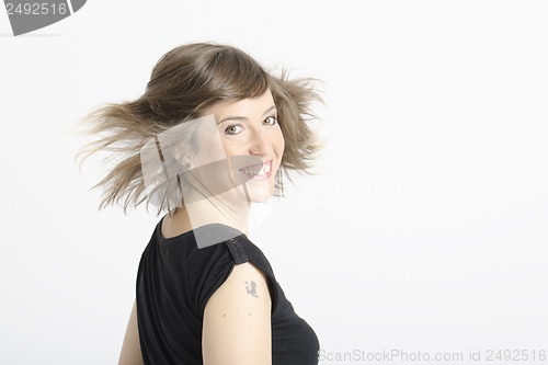 Image of real nice young woman in funny expression