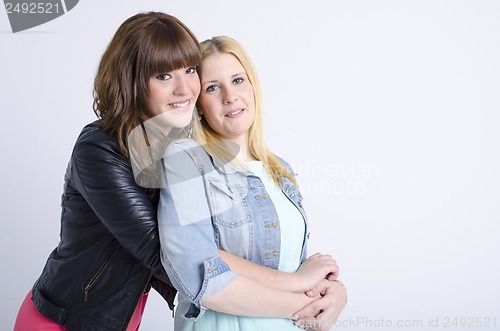 Image of two young pretty women togheter