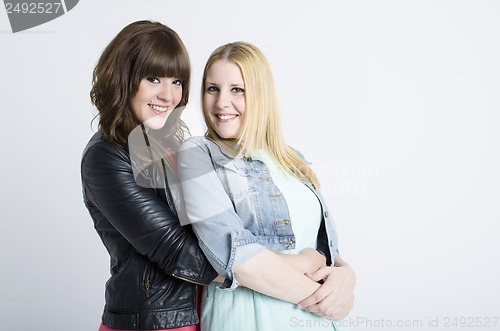 Image of two young pretty women togheter