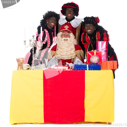 Image of Sinterklaas and a couple of his helpers