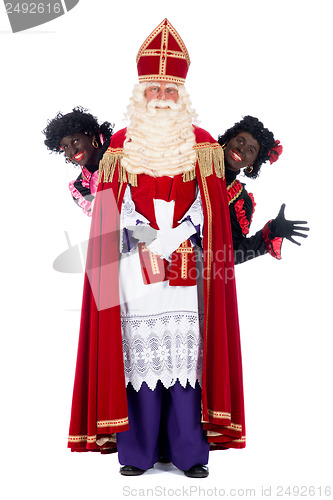 Image of Sinterklaas and a couple of his helpers