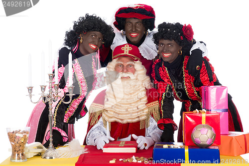 Image of Sinterklaas and a couple of his helpers