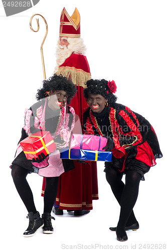 Image of Sinterklaas and a couple of his helpers