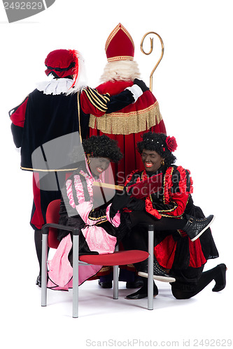 Image of Sinterklaas and a couple of his helpers