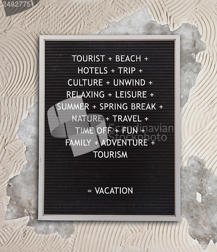 Image of Vacation concept in plastic letters on very old menu board