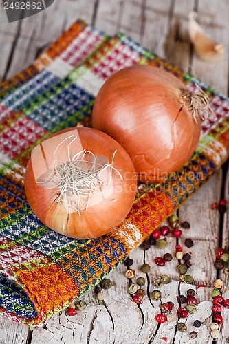 Image of fresh onions and peppercorns