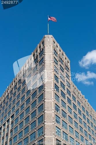 Image of American Building And Flag