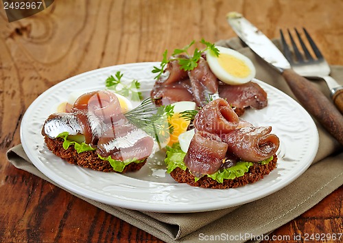 Image of sandwiches with anchovies and egg