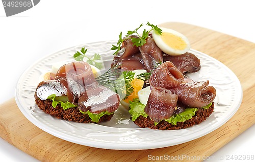 Image of sandwiches with anchovies and egg