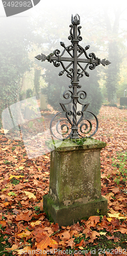 Image of idyllic autumn graveyard