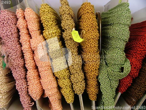 Image of texture ribbons on a shelf