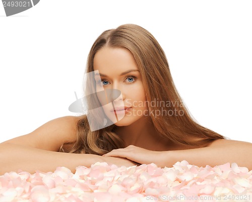 Image of woman with rose petals