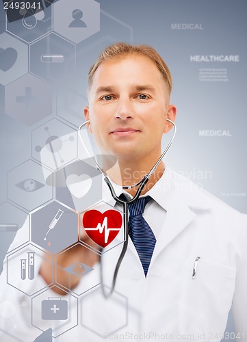 Image of male doctor with stethoscope and virtual screen