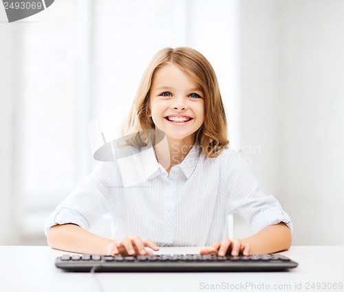 Image of student girl with keyboard