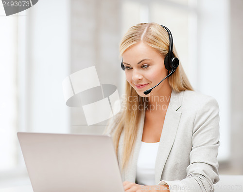 Image of friendly female helpline operator