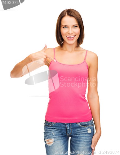 Image of woman in blank pink shirt showing thumbs up