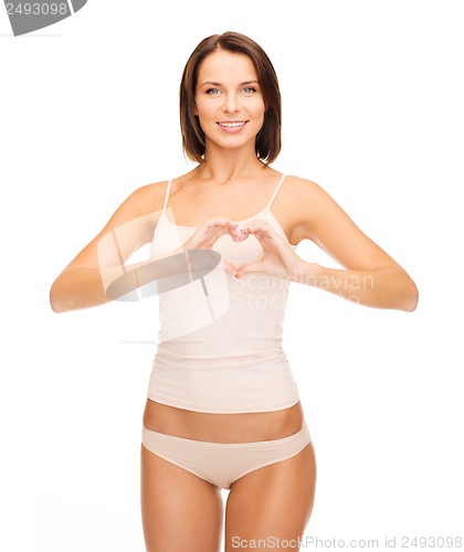 Image of woman forming heart shape