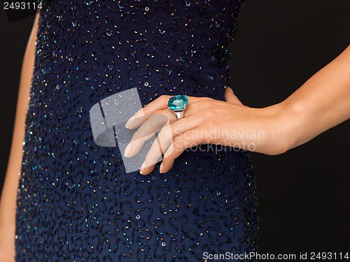 Image of beautiful woman with cocktail ring