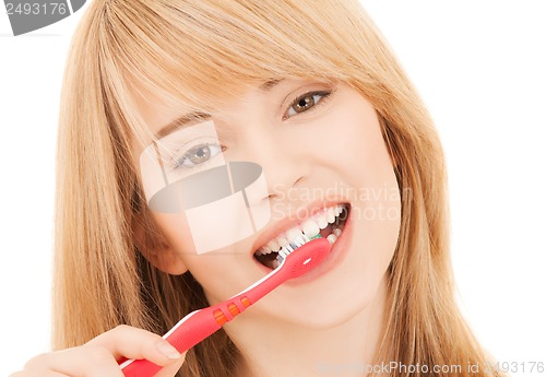 Image of teenage girl with toothbrush