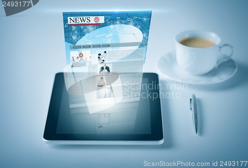Image of tablet pc with news feed