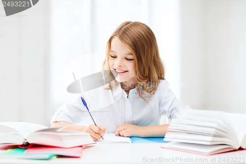 Image of student girl studying at school